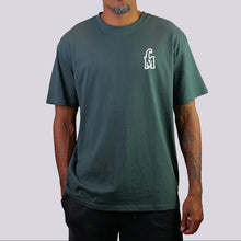 Load image into Gallery viewer, Man wearing a green t-shirt with a white logo on a plain background