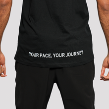 Load image into Gallery viewer, Person wearing a black outfit with 'Your Pace, Your Journey' text on a plain background