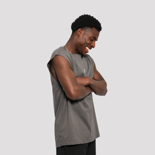Load image into Gallery viewer, Man wearing a gray sleeveless shirt against a white background