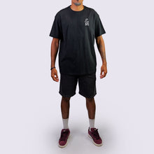 Load image into Gallery viewer, Man wearing a black t-shirt and shorts on a white background

